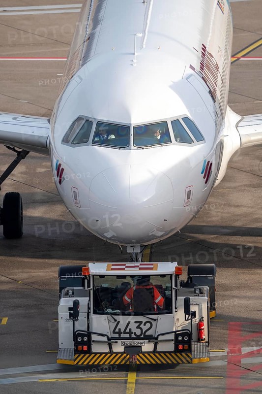 Eurowings Airbus is pushed from the gate onto the taxiway, ready to go, to Cologne/Bonn Airport, CGN, North Rhine-Westphalia, Germany