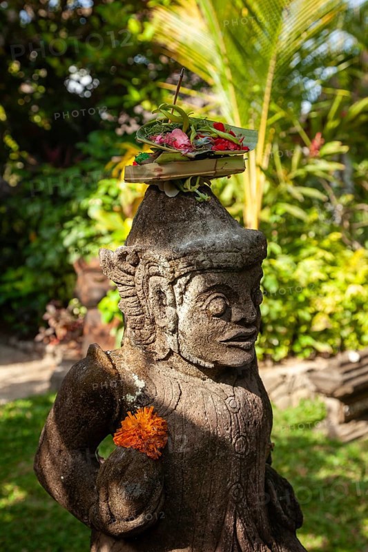 Canang Sari is a Balinese offering that expresses the Sang Hyang Widhi Wasa (God) or the creators of life. The offerings are made to maintain balance and peace on earth, between good and evil, between gods and demons, between heaven and hell, Kuta beach, Bali, Indonesia