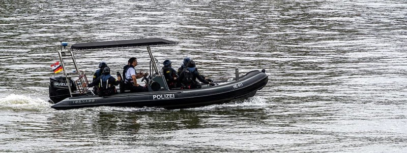 Police inflatable boat during an emergency trip on the Main in Frankfurt, Hesse, Germany