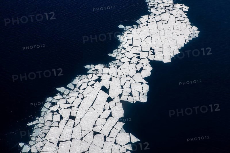 Aerial view of melting icepack in the East Greenland, Greenland (Kalaallit Nunaat), Arctic Ocean, climate change, global warming, geographically part of North America, politically part of the Kingdom of Denmark