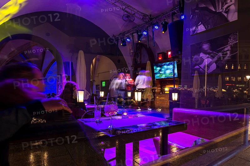 View of a karaoke bar at night, Krakow, Poland