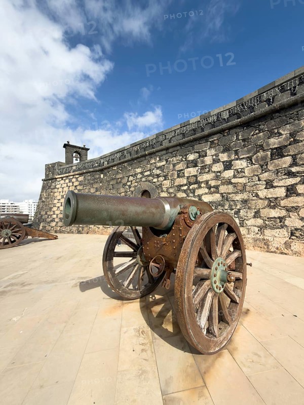 Castillo de San Gabriel fortress against blue sky with white clouds, Arrecife, Lanzarote, Canary Islands, Spain