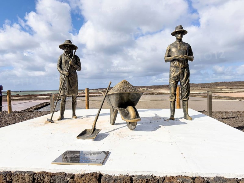 Bronze figures at the Salinas de Janubio, Lanzarote, Canary Islands, Spain