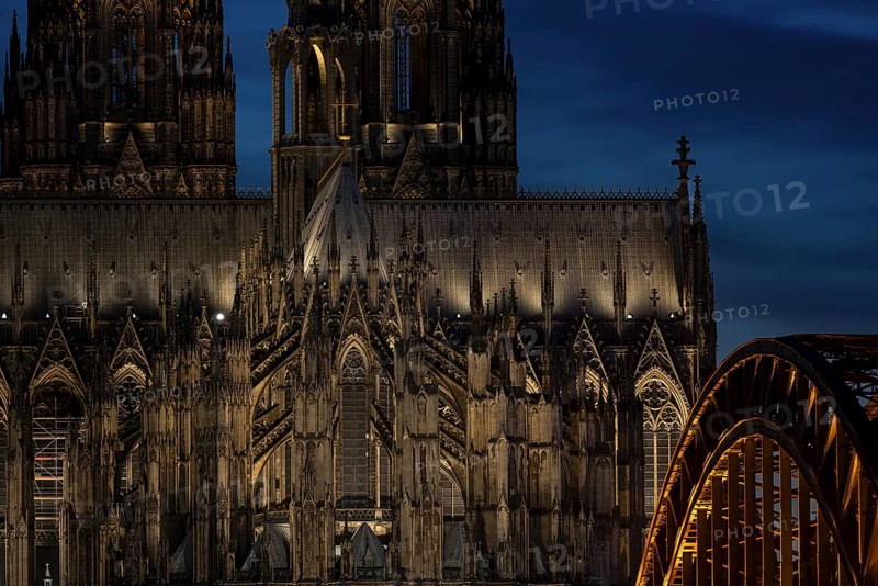 Evening atmosphere, Cologne Cathedral illuminated with LED lamps and the Hohenzollern Bridge, Cologne, North Rhine-Westphalia, Germany