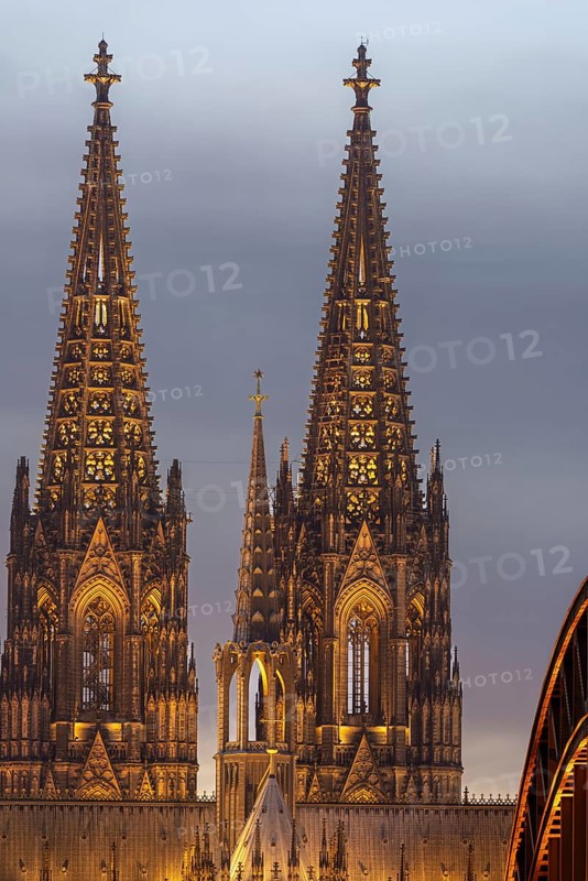 Evening atmosphere, Cologne Cathedral illuminated with LED lamps and the Hohenzollern Bridge, Cologne, North Rhine-Westphalia, Germany