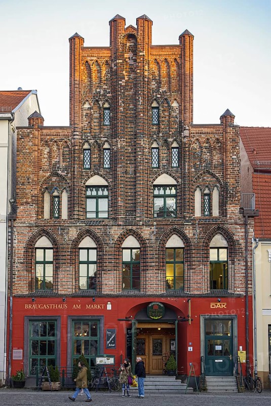 Historic brick Gothic buildings on the market square of the Hanseatic City of Greifswald, Mecklenburg-Western Pomerania, Germany, for editorial use only