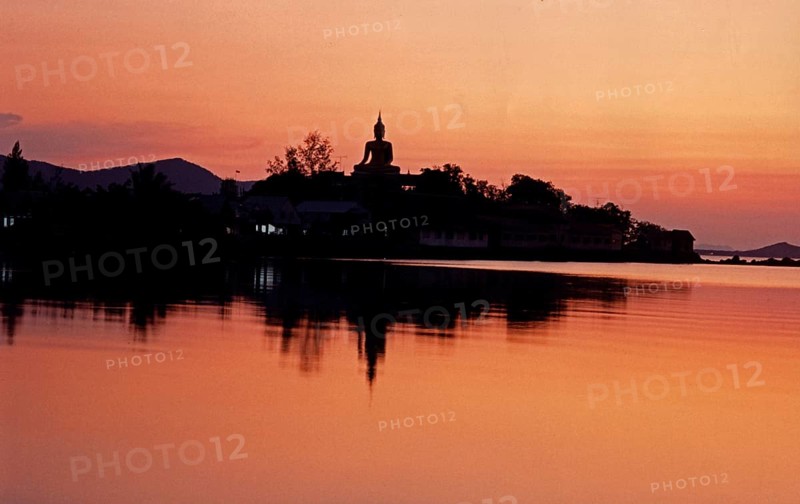 The big Buddha in Wat Phra Yai (Big Buddha Temple) at Hat Bangrak. The picture was taken in front of the renovation and shows the Buddha without the Buddhist wheel. Sunset. Buddhism, Religion, Koh Samui, Thailand, Southeast Asia