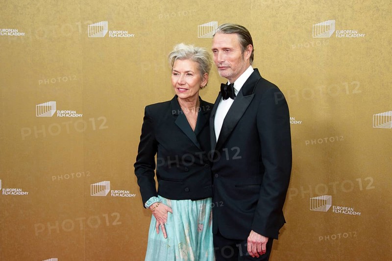 Mads Mikkelsen with woman Hanne Jacobsen, EUROPEAN FILM AWARDS Berlin 2026, photo call at the House of World Cultures, Berlin, 17.01.2026