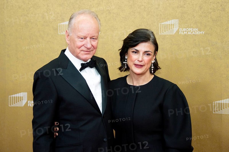 Stellan Skarsgard with woman Megan Everett, EUROPEAN FILM AWARDS Berlin 2026, photo call at the House of World Cultures, Berlin, 17.01.2026