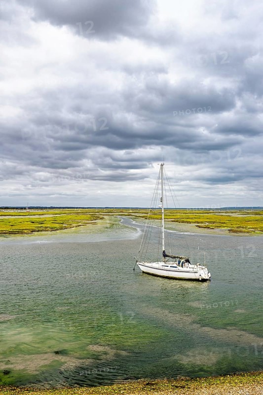 Boats and Marshes over Hurst Spit, Milford on Sea, Lymington, Hampshire, UK