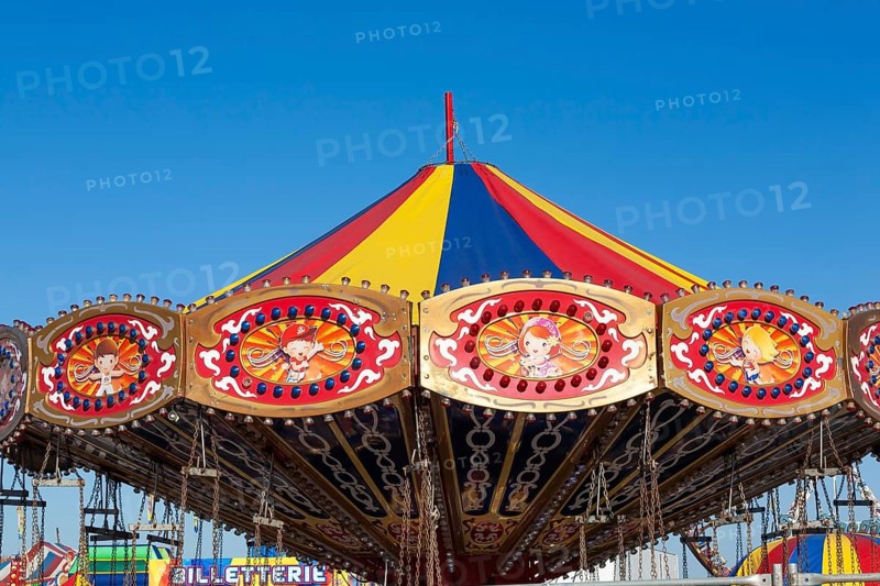 Close-up of carrousel amusement ride at Fun Show traveling amusement ride park, Old Port of Montreal, Quebec, Canada