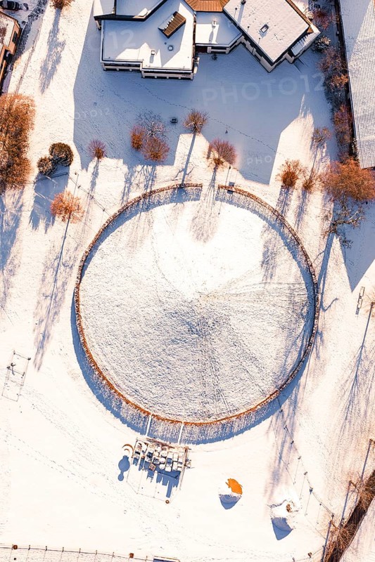 Aerial view of a circular area in snow surrounded by trees, Celtic Tomb, Nagold, Calw district, Black Forest, Germany