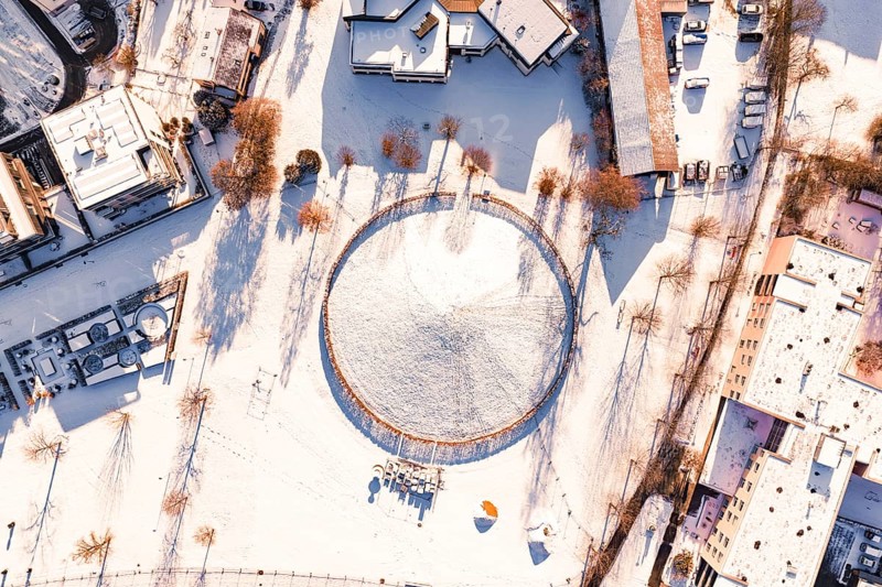 Aerial view of a snowy area surrounded by buildings, Celtic Tomb, Nagold, Calw district, Black Forest, Germany