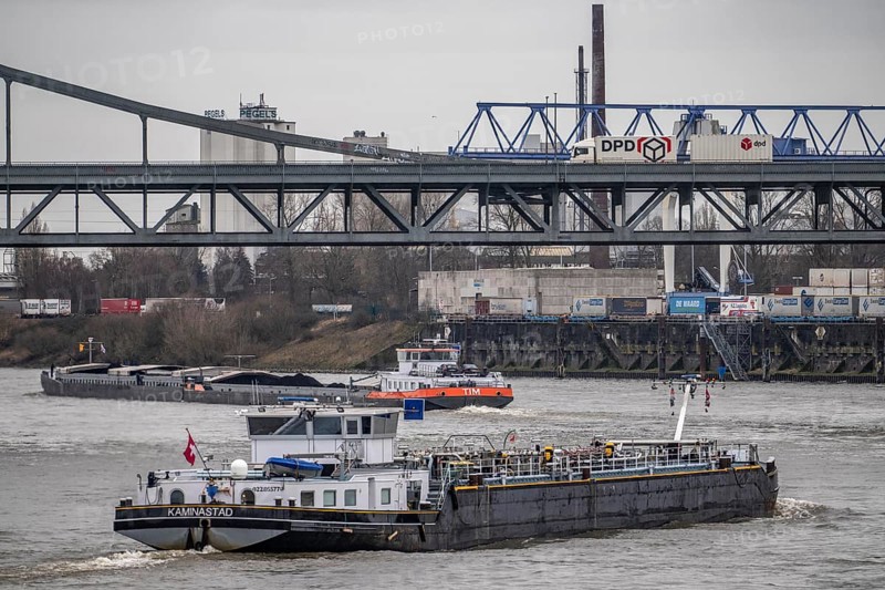 Cargo ships, Krefeld-Uerdinger bridge across the Rhine, near the Krefeld-Uerdingen Rhine port, North Rhine-Westphalia, Germany