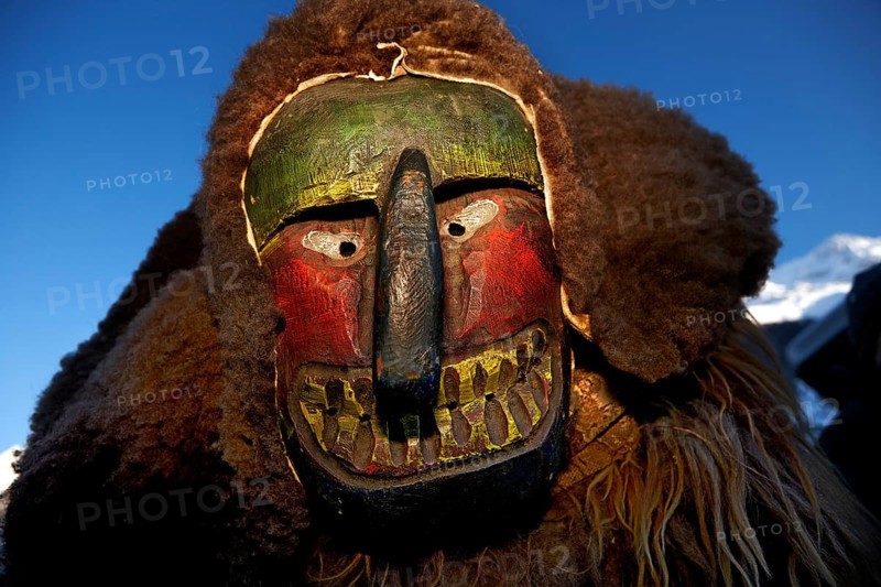 Portrait of traditional hand-carved wooden mask from the Loetschental Carnival, representing folkloric characters, spirits, and demons, Loetschental village, Valais Canton, Switzerland
