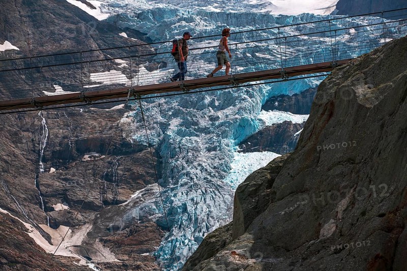 Trift Footbridge, a pedestrian suspension bridge built to replace a hiking path destroyed by glacial retreat, located near the Trift Glacier, Climate Change, Global warming, Gadmen, Canton of Bern, Switzerland