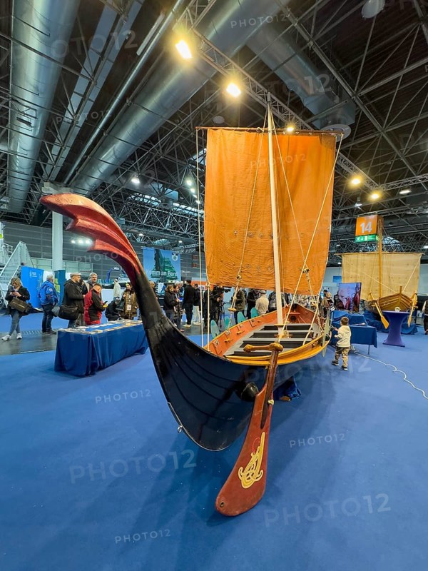 Press photo of replica Viking ship Viking boat sailing ship, large rudder blade in the middle of the picture, Messe boot Düsseldorf, North Rhine-Westphalia, Germany