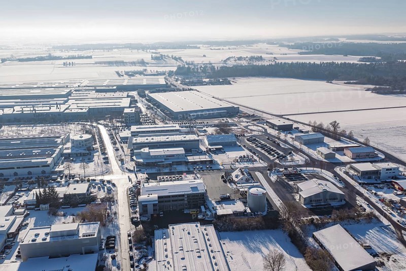Snow-covered industrial areas with clear skies from an aerial perspective, Wolfsberg industrial area, Nagold, Germany