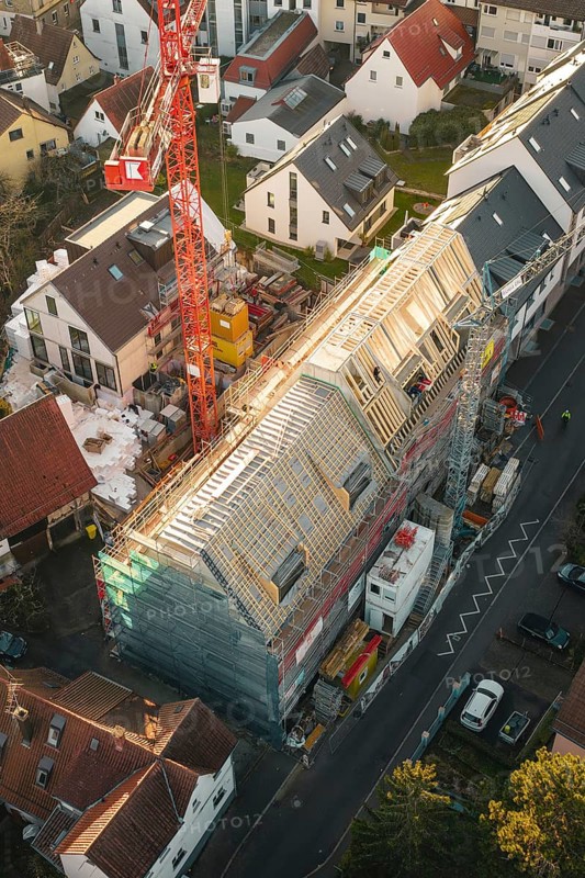 Overview of a large construction site in a residential area during roof renovation, carpentry, renovation, roof extension, Stuttgart, Germany