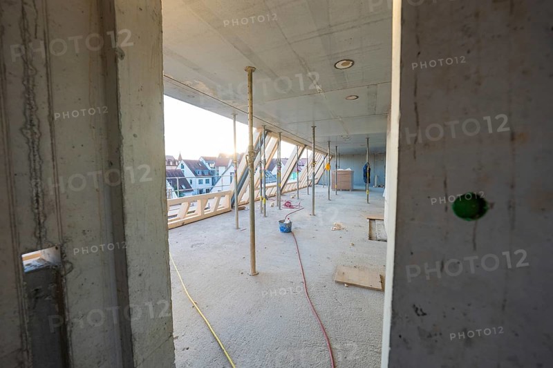 Semi-finished interior of a construction site with exposed structure and supports, carpentry construction, roof extension, renovation, Stuttgart, Germany