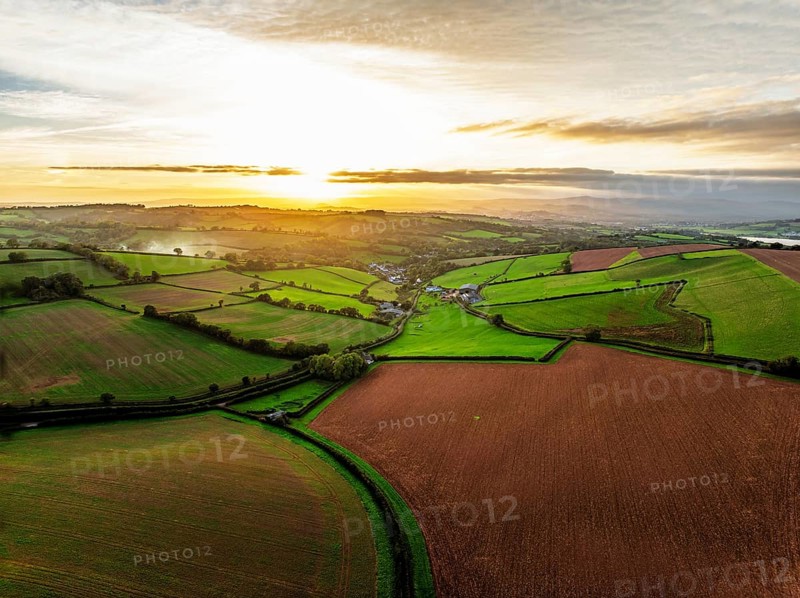 Colours of autumn Fields and Farms over Sheldon from a drone, Torbay, Devon, England, United Kingdom