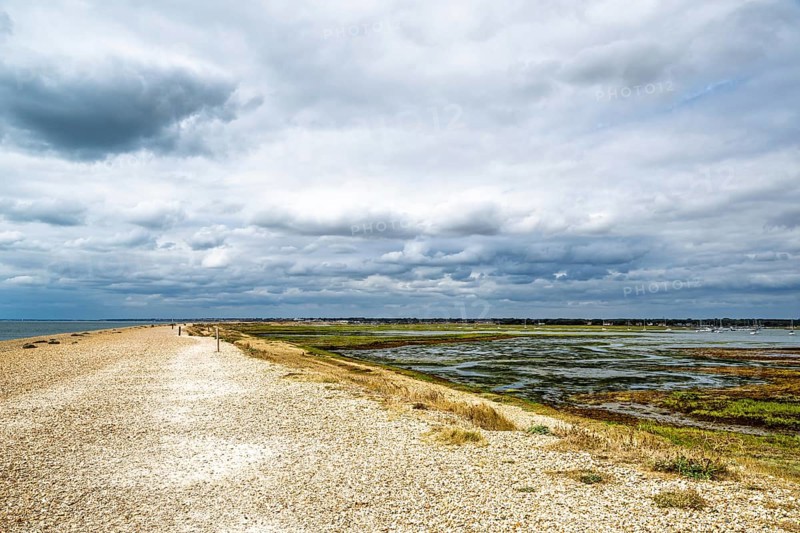 Beach and marshes over Hurst Spit, Milford on Sea, Lymington, Hampshire, UK