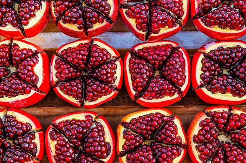 Pomegranate (Punica granatum), halved with red seeds, fruit, food, stand at the Asiatic Riverfront, Bangkok, Thailand's metropolis, Thailand