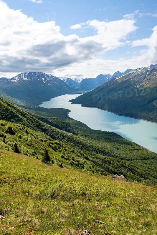 View of blue lake and mountains on Twin Peaks Trail, Eklutna Lake, Chugach Mountains, Chugach State Park, Alaska, USA