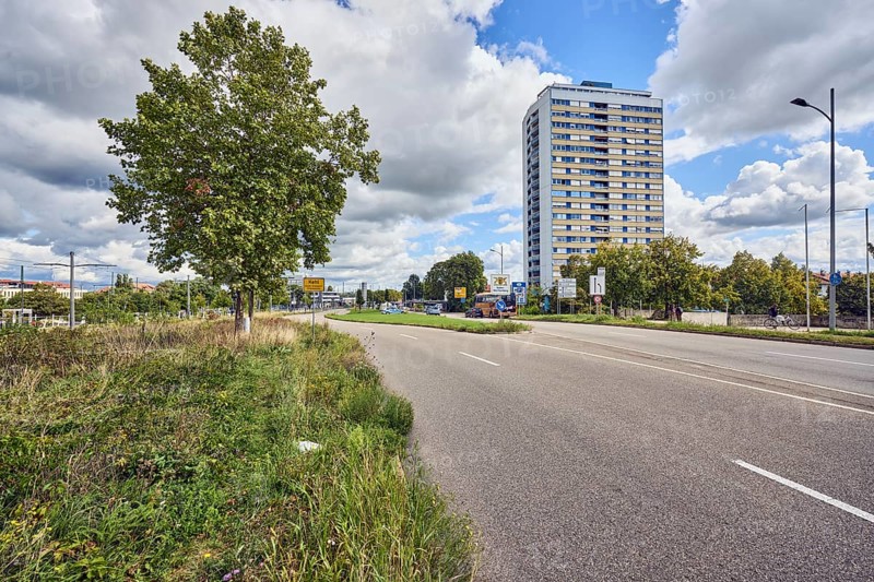 Residential silo, high-rise building, high-rise residential building, road, lanes, trees, grass, cloudy, cumulus clouds, cumulus congestus clouds, Strassburger Straße, Kehl, Upper Rhine Valley, Ortenaukreis, Baden-Württemberg, Germany