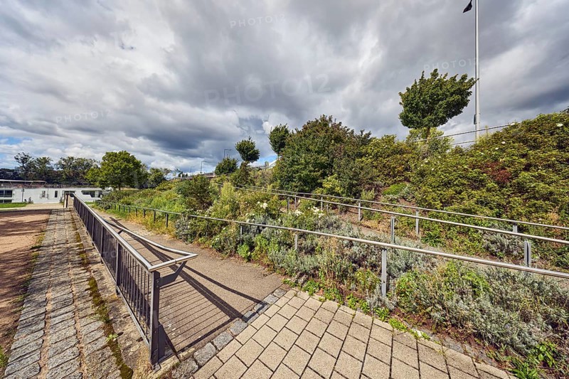 Access to Europe Bridge, park, wooden ramp, stainless steel railing, trees, flower bed, plants, shrubs, path, rainy mood, sunlight, sunny, cloudy, Cumulus congestus clouds, Kehl, Upper Rhine Plain, Ortenau district, Baden-Württemberg, Germany