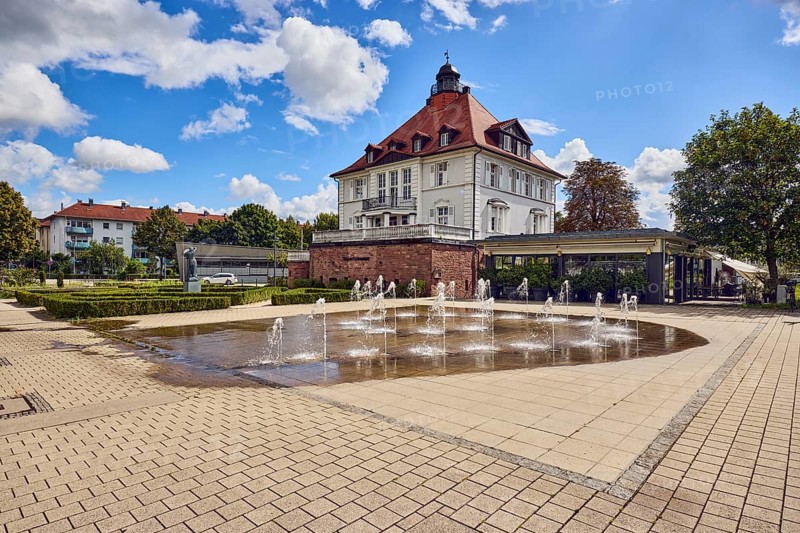 Villa Schmidt restaurant, park, fountain, hedge, lawn, paths, trees, blue partly cloudy sky, cumulus clouds, Kehl, Upper Rhine Plain, Ortenau district, Baden-Württemberg, Germany