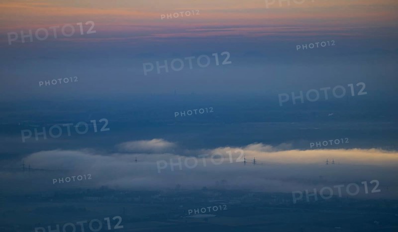 Aerial view of the city of Heidelberg on the Neckar, fog landscape of low-hanging clouds and fog fields floating and waving in the evening light over the Upper Rhine plain in the Rhine-Neckar metropolitan region, Heidelberg, Baden-Württemberg, Germany