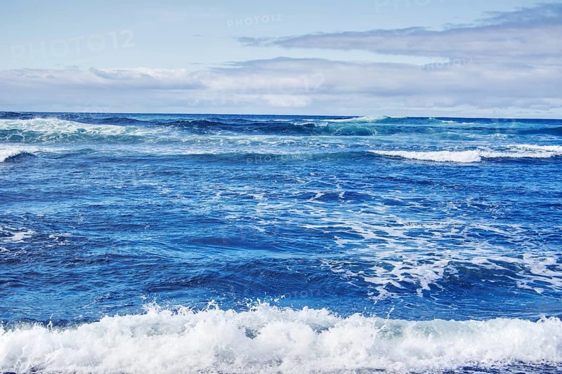 Extensive ocean with foaming waves under a partly cloudy sky, Playa del Janubio, Yaiza Lanzarote