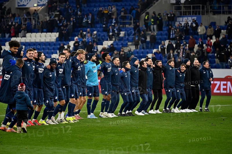 TSG 1899 Hoffenheim players celebrate victory ahead of the fan curve, PreZero Arena, Sinsheim, Baden-Württemberg, Germany