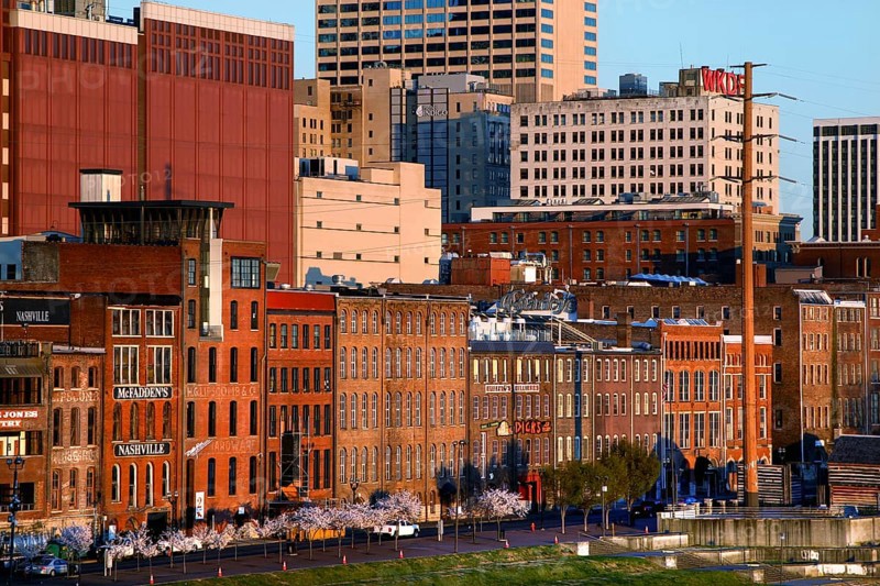 Urban skyline with old and new buildings on the riverbank in Nashville, Nashville, Tennessee, USA