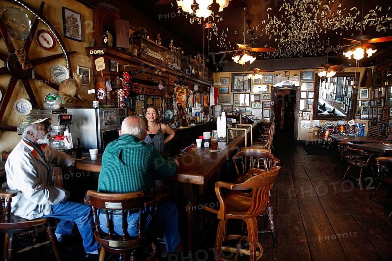 Rustic bar with cozy atmosphere and wooden furniture on Silver Street, Natchez, Mississippi, USA