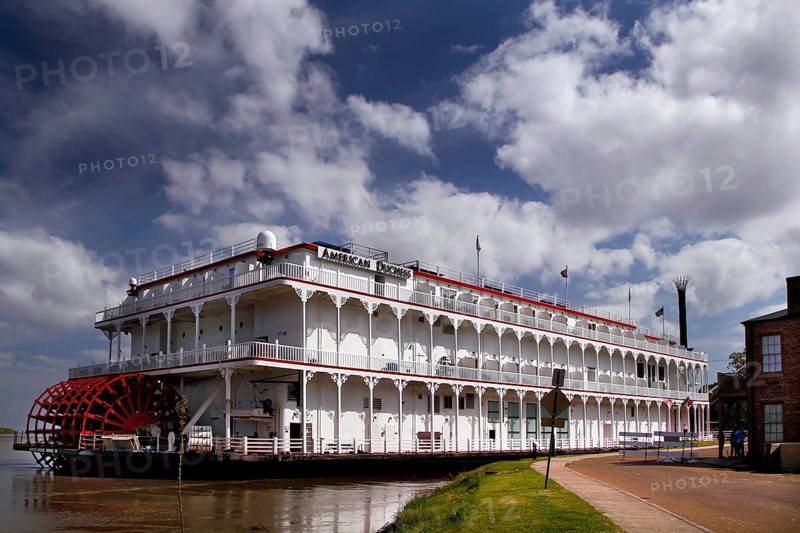 Large paddle steamer on the riverbank under a cloudy sky, Natchez, Mississippi, USA
