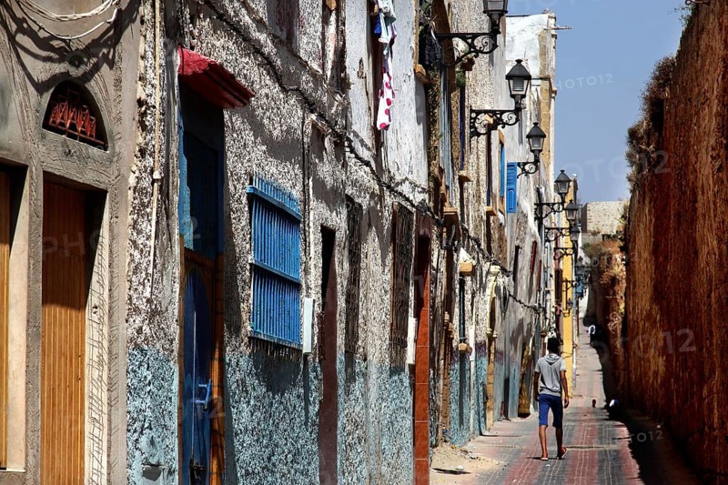 Narrow street with colorful windows and old facades in the Medina of Safi, Safi, Doukkala-Abda, Morocco