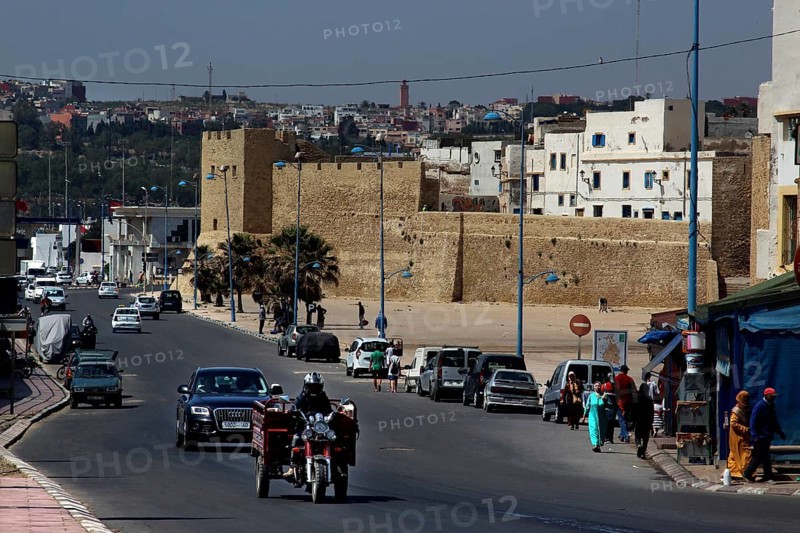 Bustling street in front of the historic city wall in the medina of Safi, Safi, Doukkala-Abda, Morocco