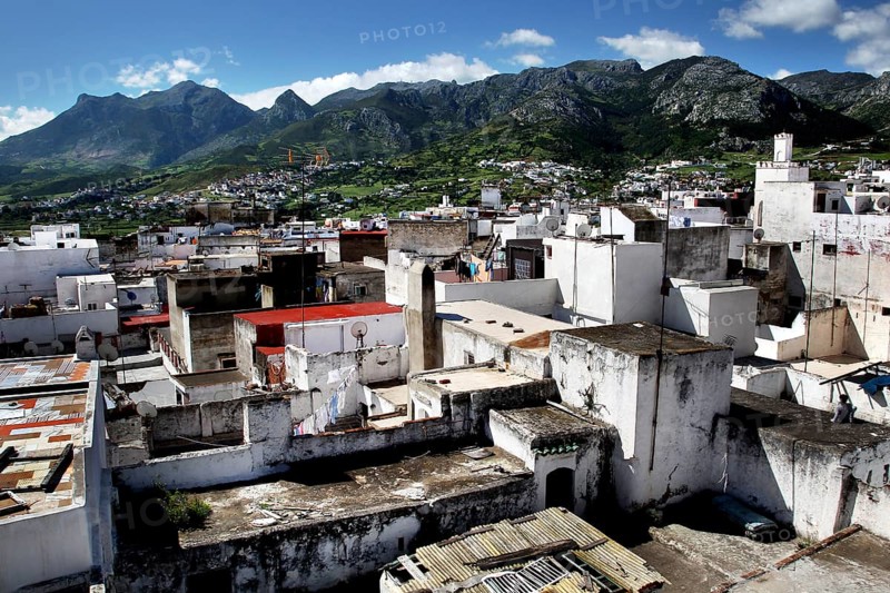 City view of Tetouan with white buildings and mountains in the background, Tetouan, Morocco