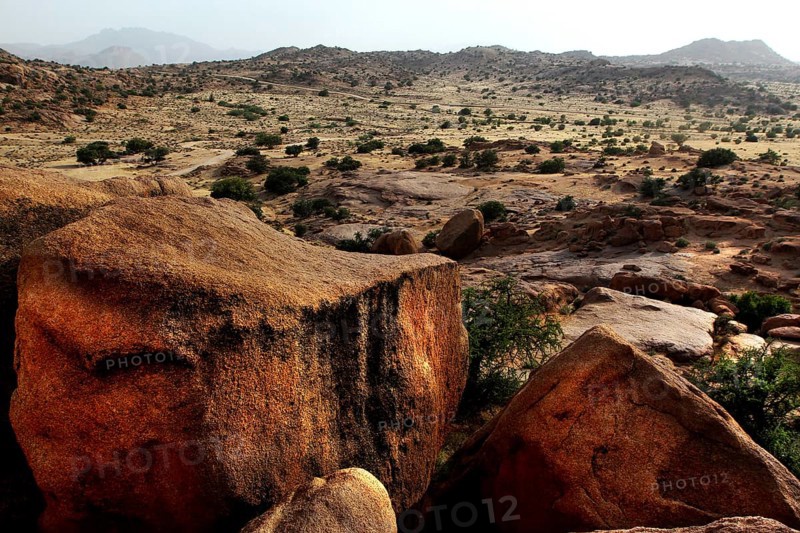 Rocks in the vast desert landscape in the region around Tafraoute, Tafraoute, Souss-Massa, Morocco