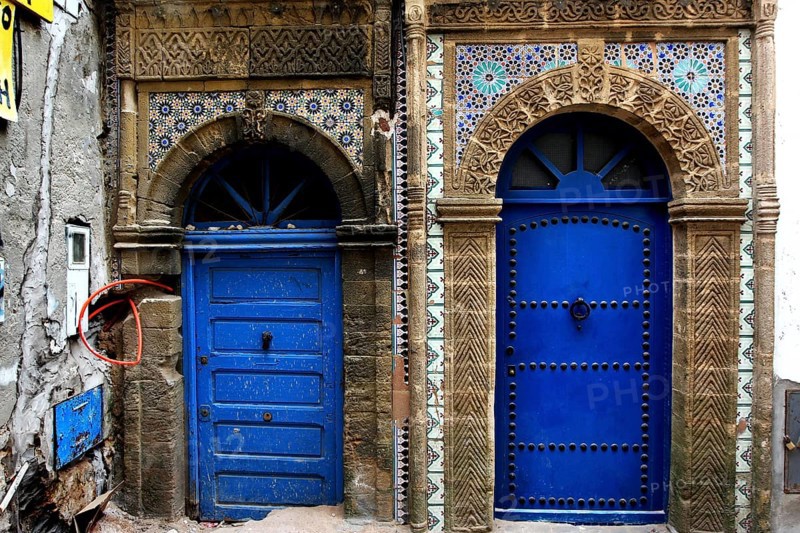 Two ornately decorated blue doors in the old town of Essaouira, Essaouira, Morocco