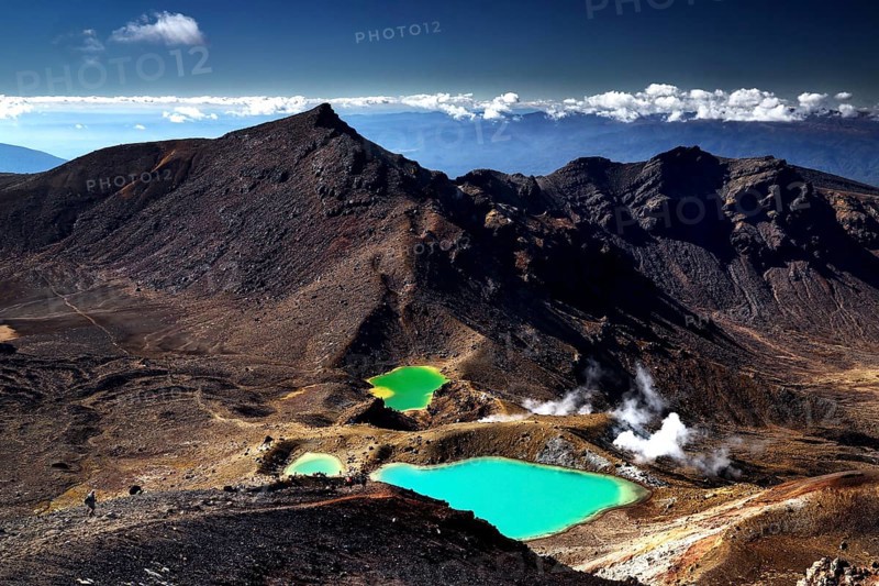 Brilliant green Emerald Lakes amidst steep volcanic landscape, Tongariro National Park, New Zealand