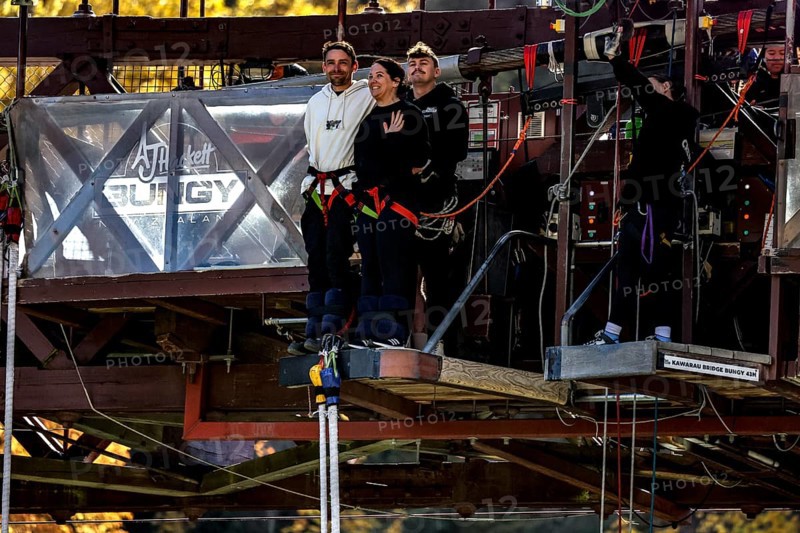Two people are ready for a bungee jump from the Kawarau Bridge, the excitement is palpable, Queenstown, Otago, New Zealand