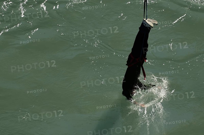 Single bungee jumper approaches the water of Kawarau Gorge, Queenstown, Otago, New Zealand