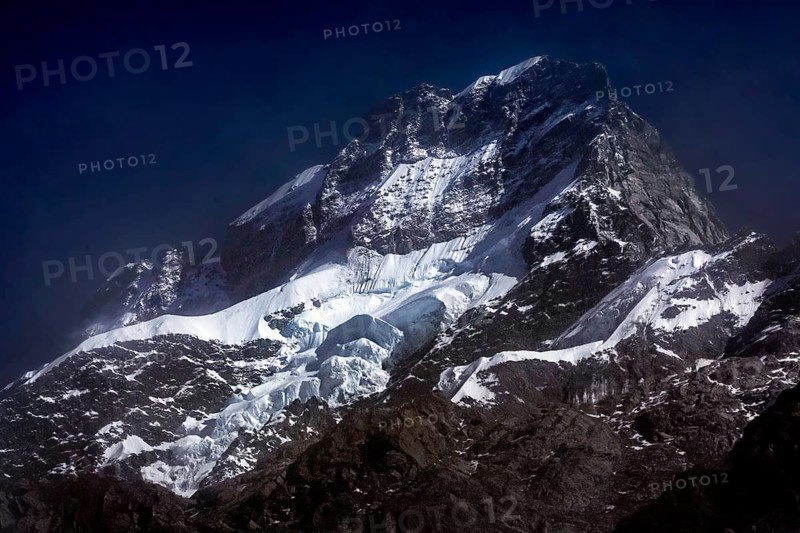 Snow-capped mountains with glaciers under night sky in Hocker Valley, New Zealand, zero