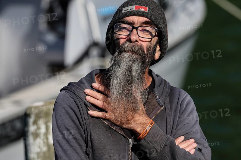 Elderly man with long grey beard delivering mail at Pelorus Mailrun
