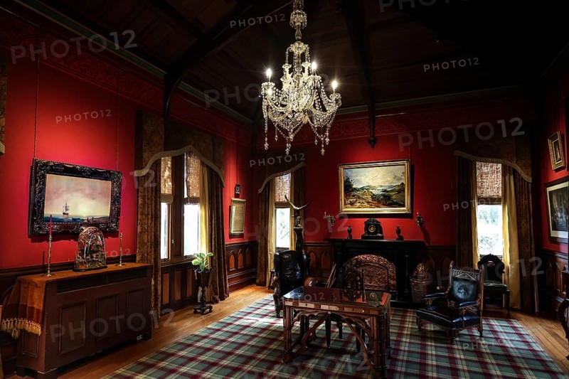 Sumptuous room in the castle with antique furniture and a large chandelier, Larnach Castle, Otago Peninsula, New Zealand