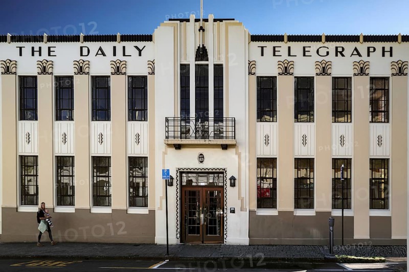 Art deco façade of a newspaper building with distinctive columns, Napier, Hawke's Bay, New Zealand