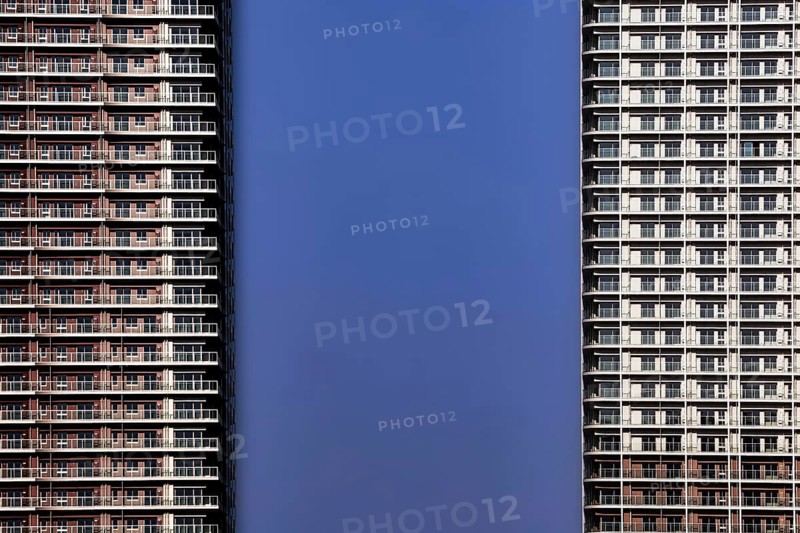 Skyscrapers with modern architecture against a clear blue sky, Tokyo, Tokyo Bay, Japan